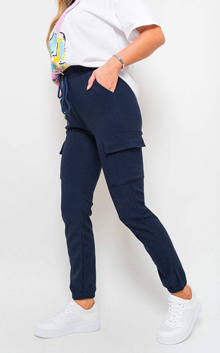 Cargo pocket trouser with drawstring in navy blue, featuring ample pockets and a comfortable fit for outdoor adventures.