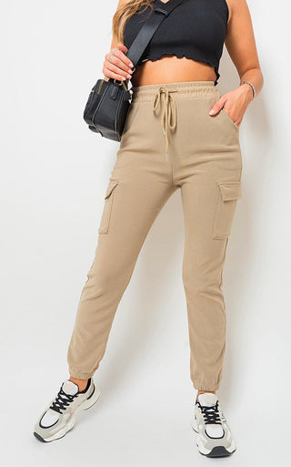 Cargo Pocket Trouser with drawstring and side pockets, styled for urban and outdoor wear.