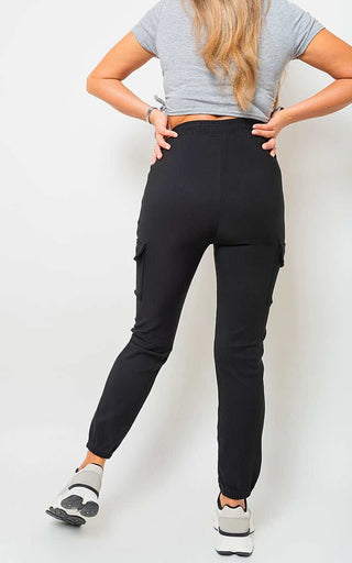 Cargo Pocket Trouser with drawstring and side pockets in black, styled for urban adventures.