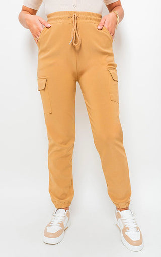 Cargo Pocket Trouser with drawstring and side pockets in tan color.