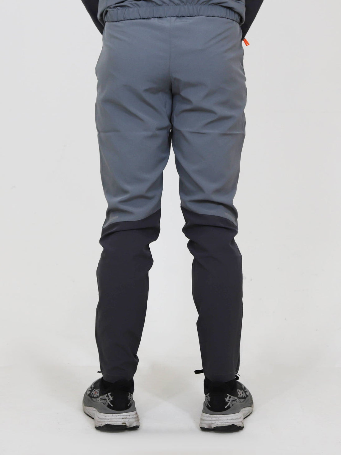 Back view of North Peak Glacier Track Pant in grey and black with athletic fit