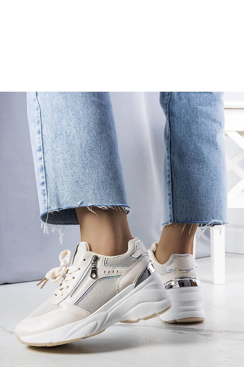 Limited Edition Ani Trainers, beige wedge sneakers with white rubber sole, perfect for summer.