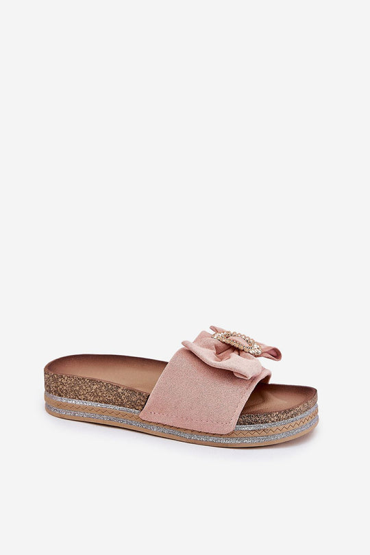 Suede flip-flops with bow, decorative brooch, and sequin platform.