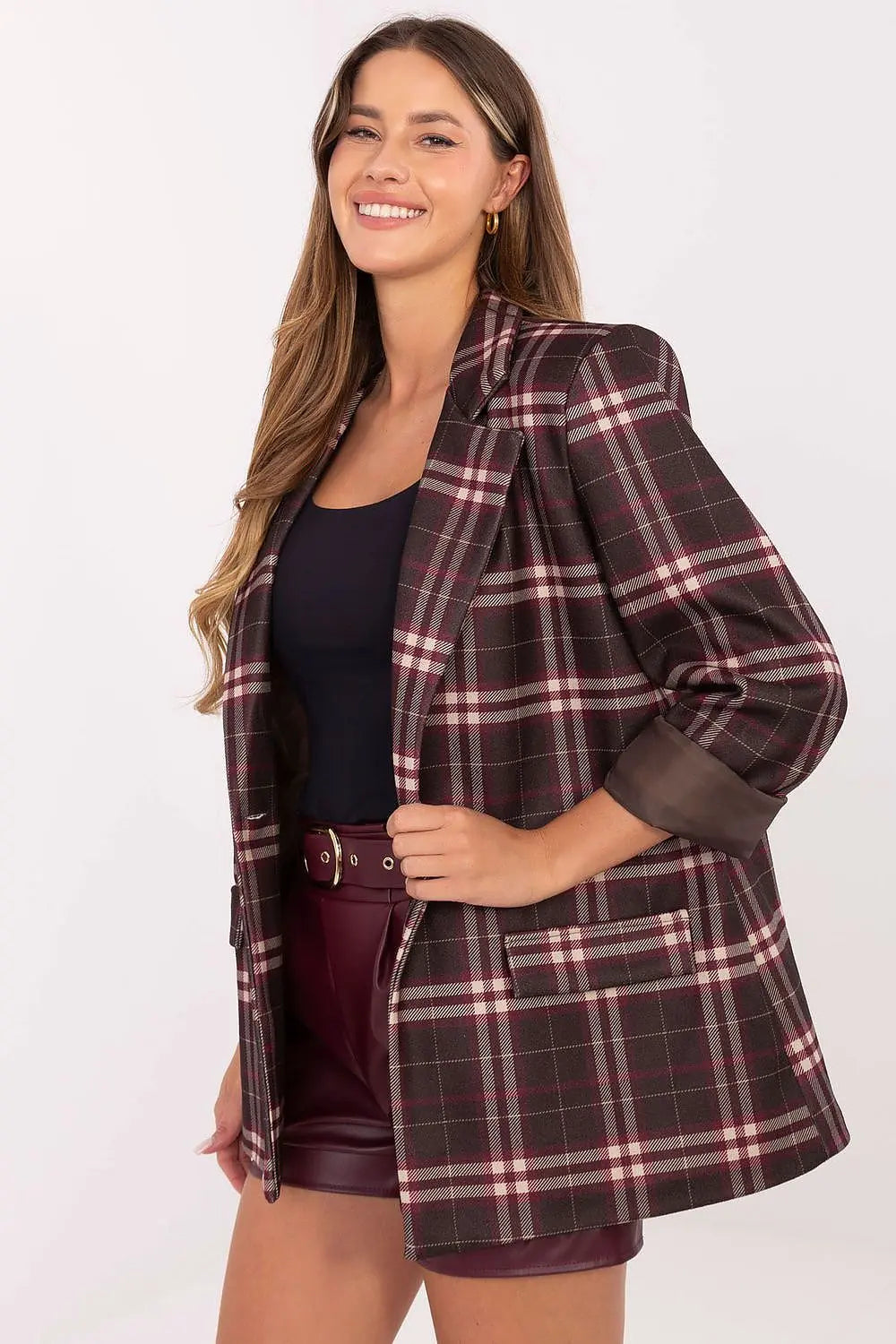 woman wearing stylish women's checked blazer with buttoned front and long sleeves